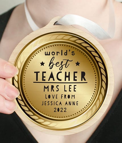 Personalised Worlds Best Teacher Round Wooden Medal - ItJustGotPersonal.co.uk